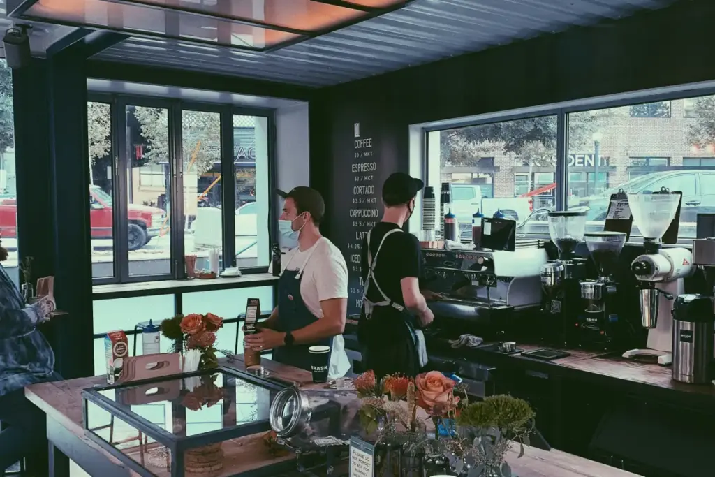 Kauai Trip Planning Tips: Must-See Trails & Beaches a bustling coffee shop with patrons enjoying their drinks