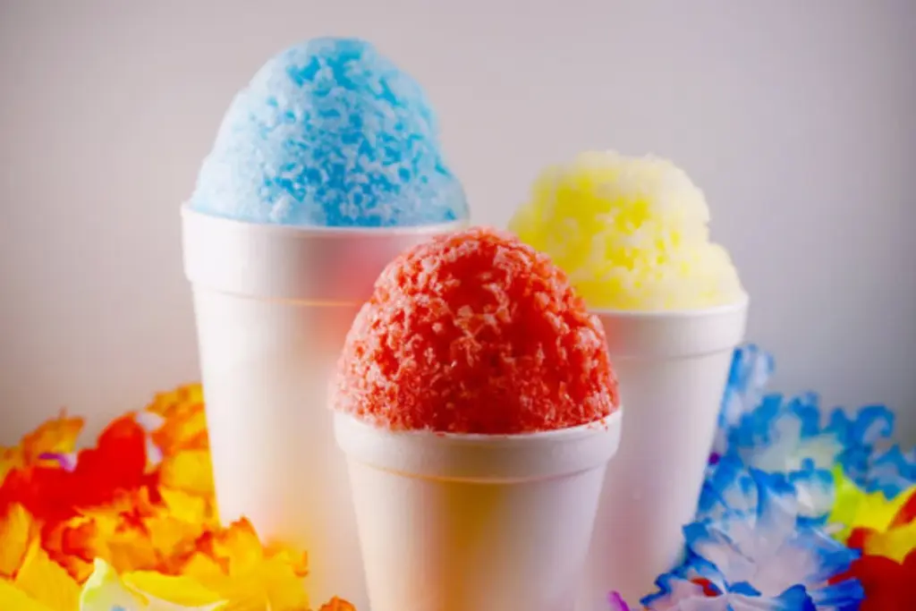 Kauai Trip Planning Tips: Must-See Trails & Beaches a vibrant bowl of shave ice with tropical flavors