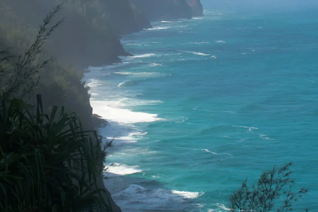 Kauai Trip Planning Tips: Must-See Trails & Beaches kauai trip planning tips misty coastal cliffs ocean